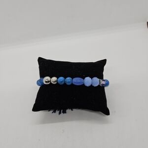 blue beaded stretch bracelet with tassel